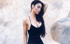 Eva Marie Sure Knows How To Fill Out A Little Black Dress