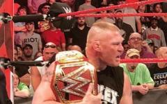 Brock Lesnar Clutching His Championship