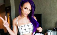 Sasha Banks With Her Barney Backpack