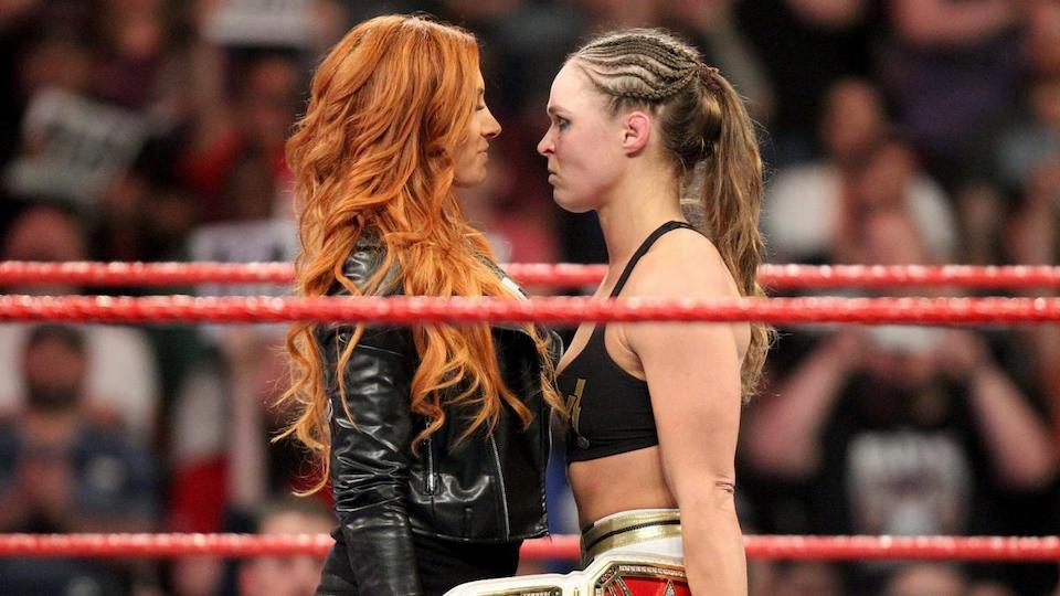 becky-lynch-squares-off-with-ronda-rousey-raw