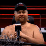 Paul Walter Hauser Explains His Wrestling Pay: “My Pay Differs Based On The Company”