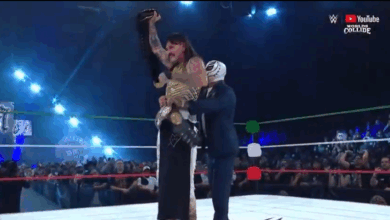 Dominik Mysterio Captures AAA Mega Title At WWE x AAA Worlds Collide, Forces Rey Mysterio To Put Title Around His Waist