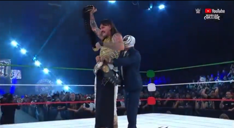 Dominik Mysterio Captures AAA Mega Title At WWE x AAA Worlds Collide, Forces Rey Mysterio To Put Title Around His Waist