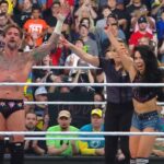 AJ Lee Submits Becky Lynch; Lee & CM Punk Def. Lynch & Seth Rollins At WWE Wrestlepalooza