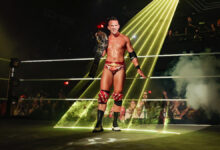 Ricky Saints (red) vs Oba Femi (black/red/blue)