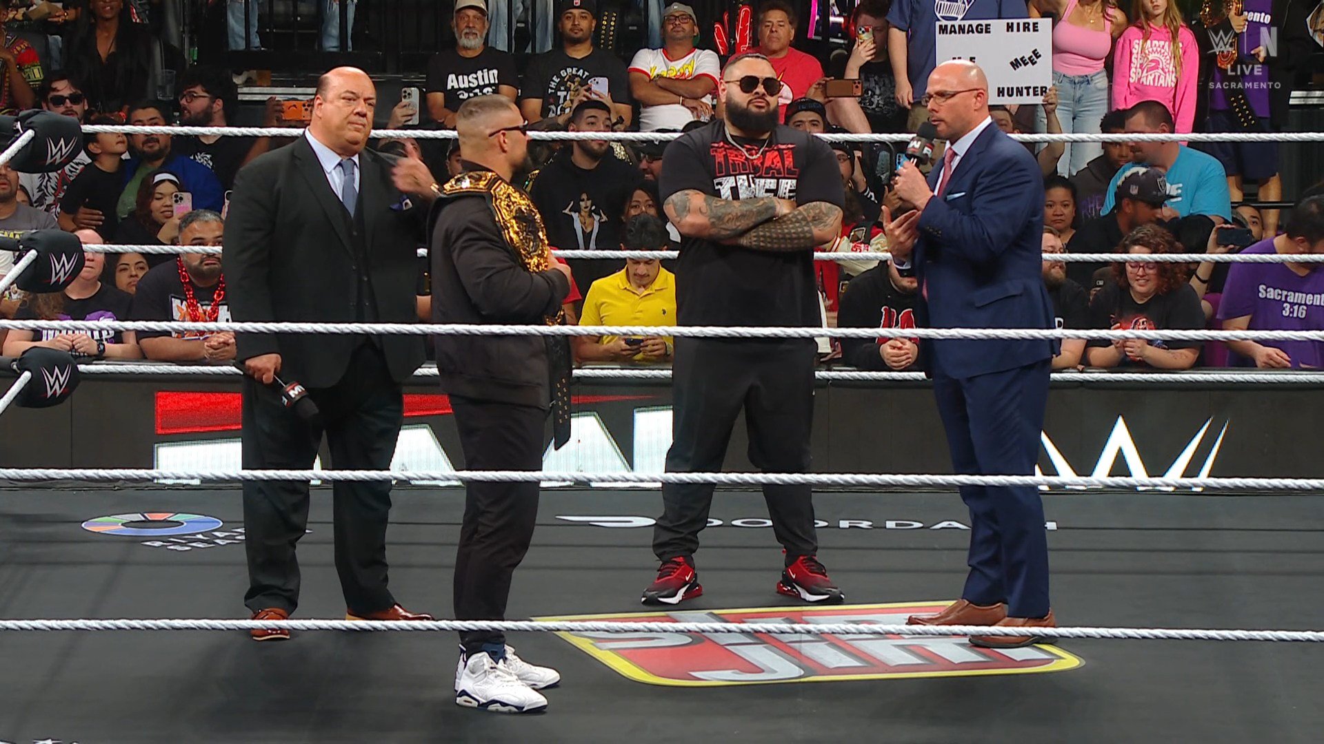 Adam Pearce Paul Heyman Seth Rollins
