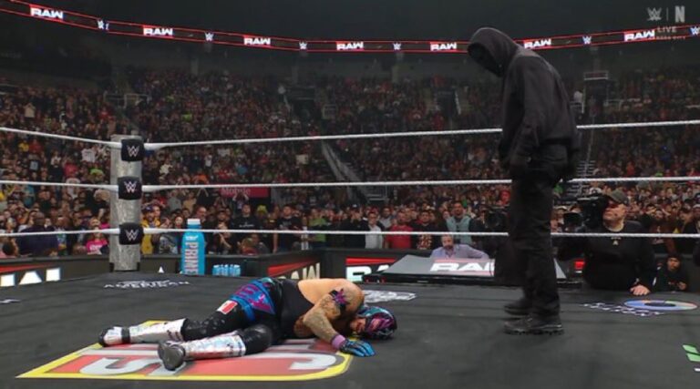 Mystery Masked Man Returns On WWE Raw, Attacks Rey Mysterio And LA Knight