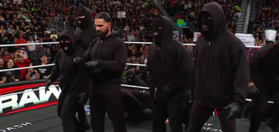 Seth Rollins Throws Off The Vision With A Swarm Of Masked Individuals On WWE Raw