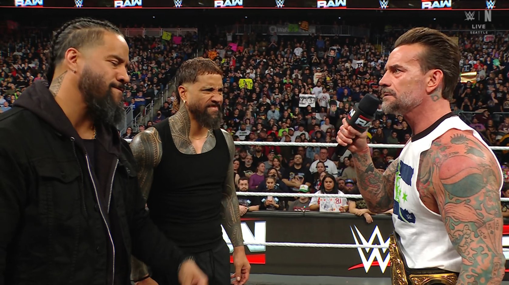 CM Punk 'Apologizes' For Line About Sika, Gets Punched By Jimmy Uso On WWE Raw