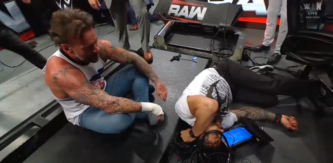 CM Punk Roman Reigns WWE Raw