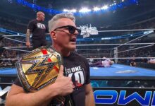 Pat McAfee with the WWE Title