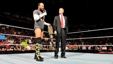 cm punk, john laurinaitis
