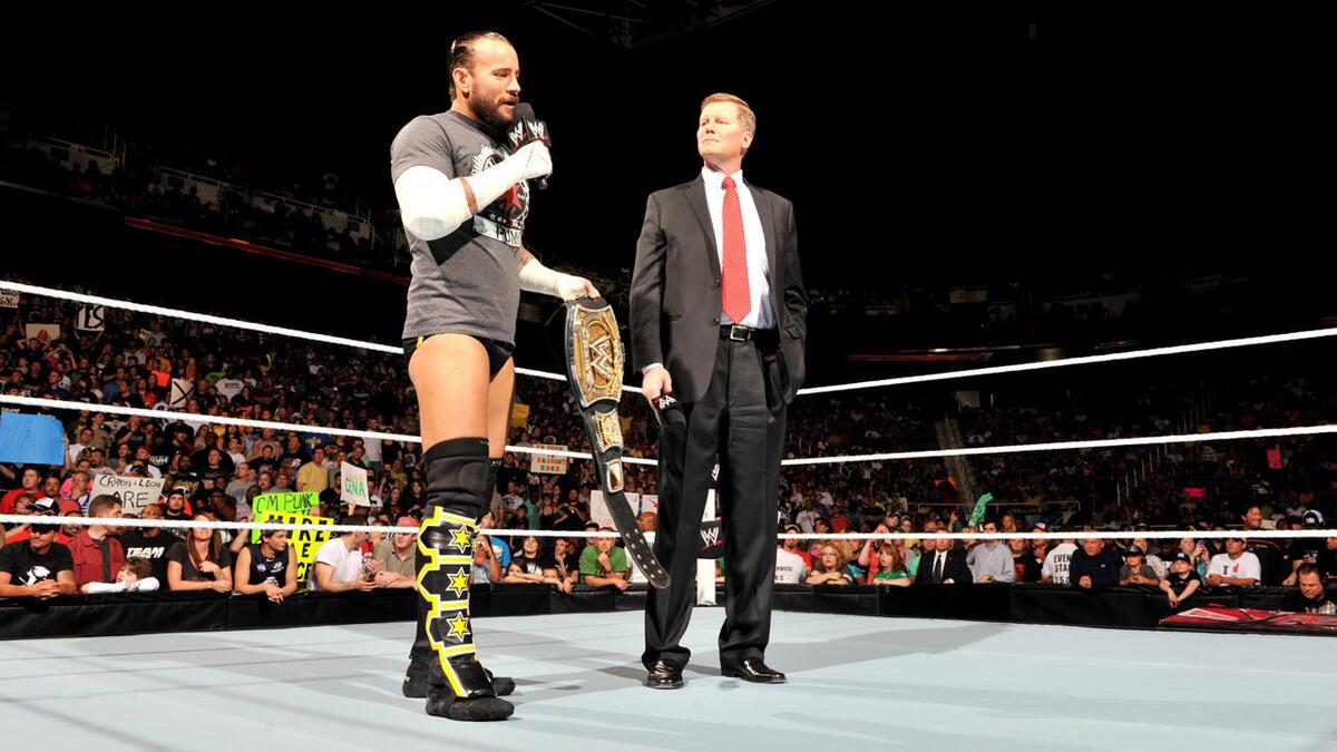 cm punk, john laurinaitis