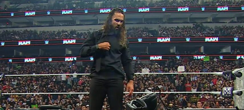 Seth Rollins Takes Down Roman Reigns With Pedigree And Stomp After Trading Verbal Barbs On WWE Raw