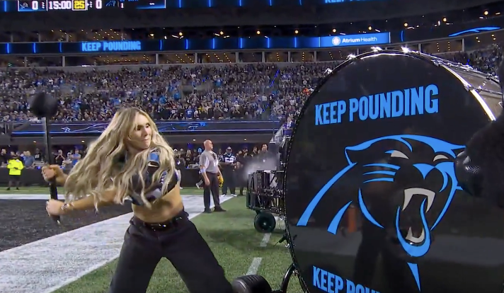Charlotte Flair Bangs Keep Pounding Drum At Carolina Panthers Game